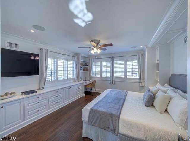 bedroom featuring dark wood-type flooring, ceiling fan, and ornamental molding