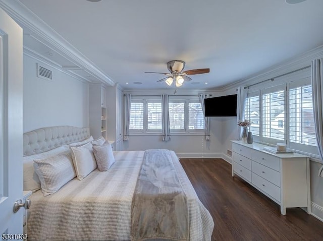 bedroom featuring ceiling fan, dark hardwood / wood-style floors, ornamental molding, and multiple windows