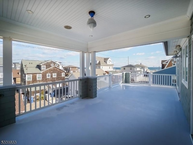 view of patio featuring a balcony