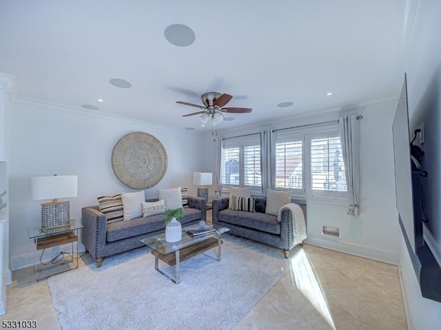 tiled living room featuring ceiling fan and crown molding