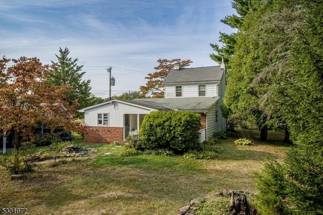 exterior space featuring a yard