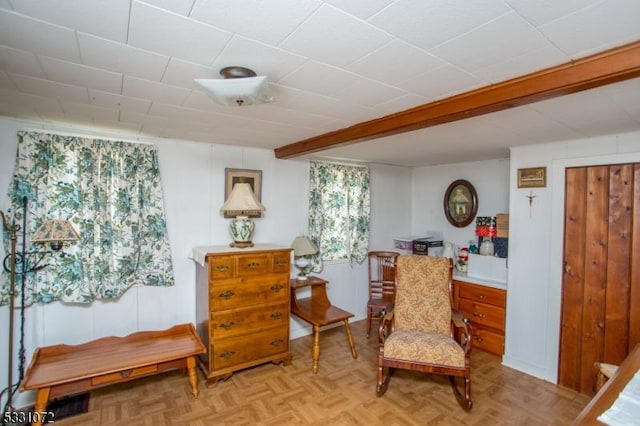 sitting room featuring light parquet flooring