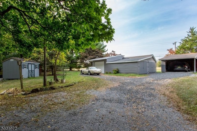 exterior space with a carport and a storage shed