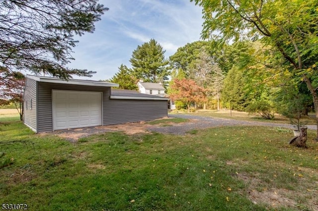 view of yard featuring a garage