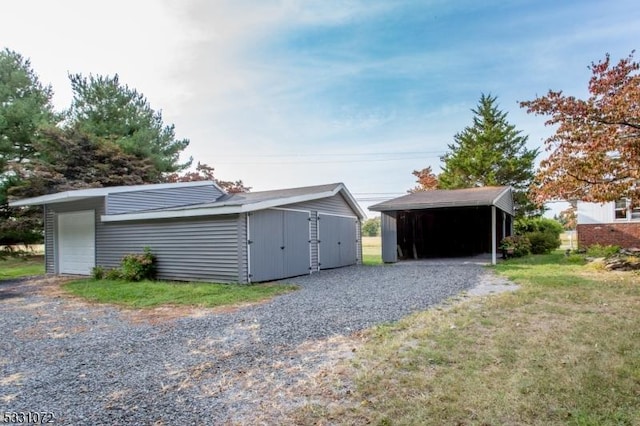 garage featuring a carport