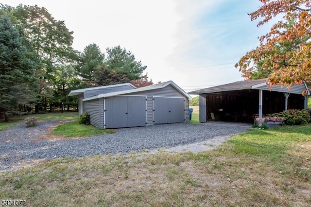 garage with a yard