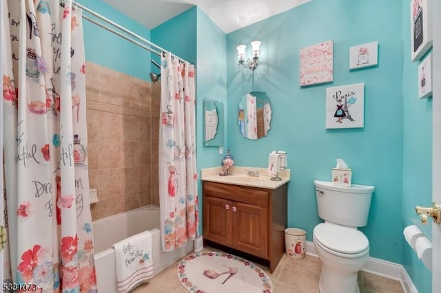 full bathroom with tile patterned flooring, shower / bath combination with curtain, vanity, and toilet