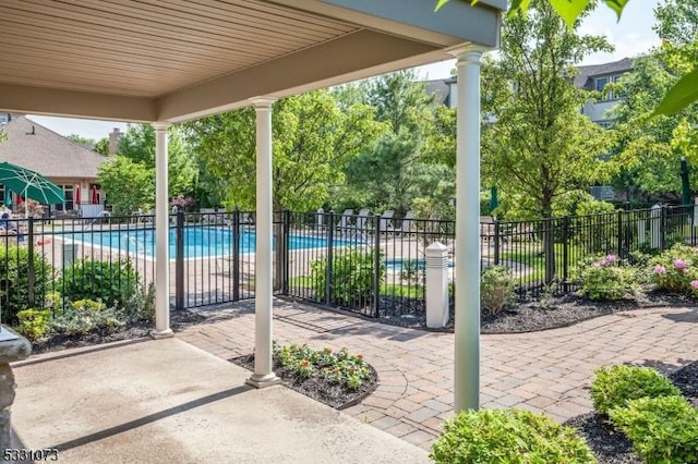 view of patio with a community pool