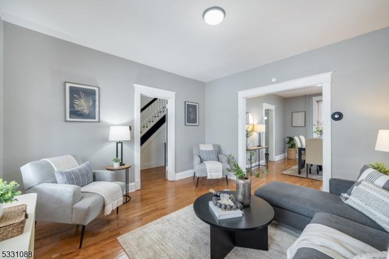 living room with light hardwood / wood-style flooring