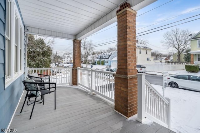 deck with covered porch