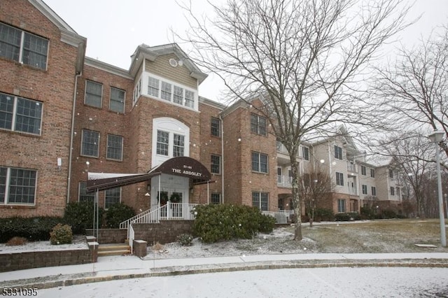 view of snow covered property