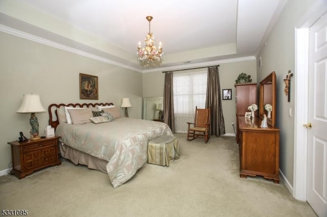 carpeted bedroom with a raised ceiling, crown molding, and a chandelier