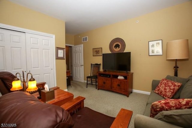 living room featuring light carpet