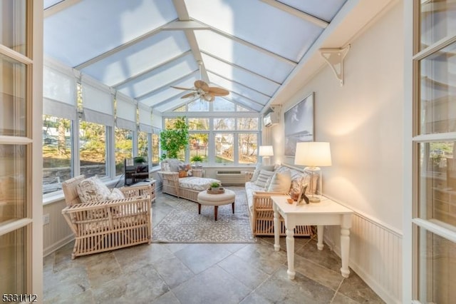 sunroom / solarium with a healthy amount of sunlight, ceiling fan, and lofted ceiling