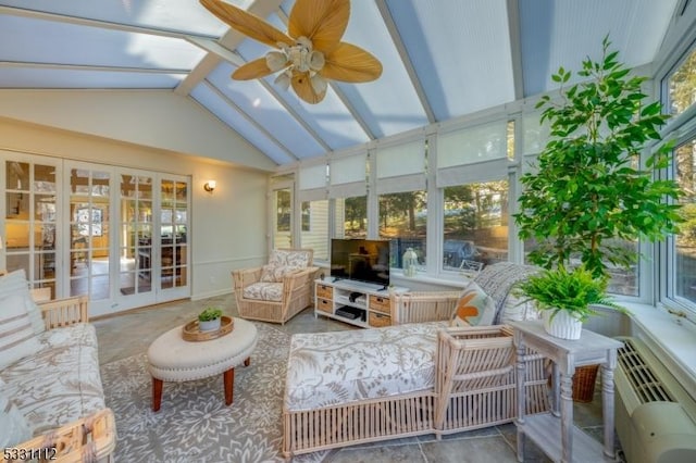 sunroom / solarium featuring ceiling fan, french doors, lofted ceiling, and a wall unit AC