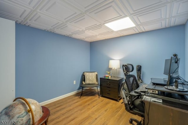 home office featuring light hardwood / wood-style floors