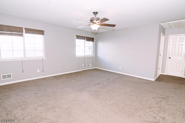 carpeted empty room with ceiling fan