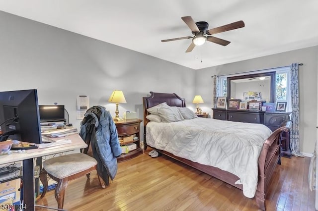 bedroom featuring a ceiling fan and wood finished floors