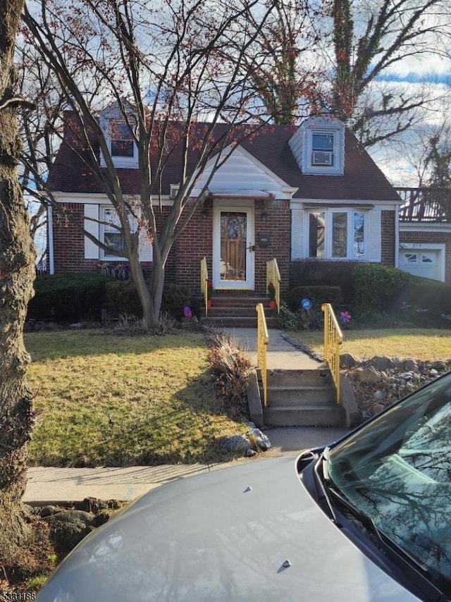 view of front of home with a front yard