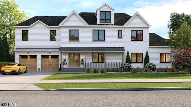 view of front of property with a porch, a garage, and a front lawn