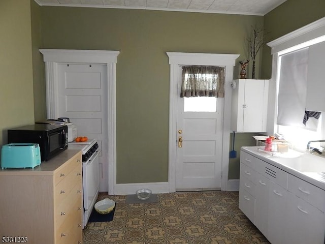 kitchen featuring white stove