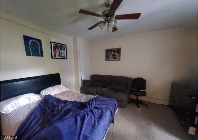 carpeted living room featuring ceiling fan