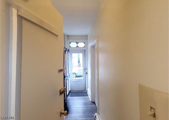 corridor with dark wood-type flooring