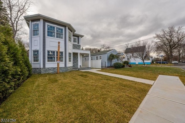 view of front of house with a front lawn