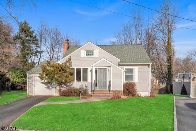 view of front of home with aphalt driveway, roof with shingles, a chimney, an attached garage, and a front lawn