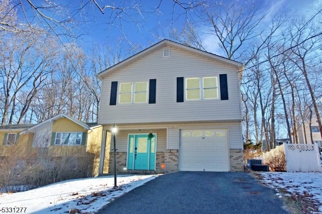 view of front of home with a garage