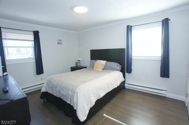 bedroom with baseboard heating, dark hardwood / wood-style flooring, and crown molding