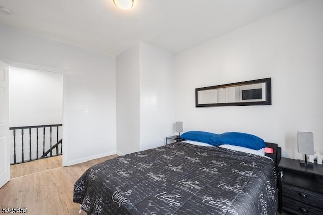 bedroom featuring wood-type flooring