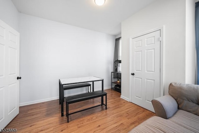 sitting room with hardwood / wood-style floors