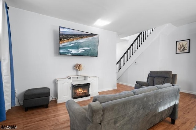 living room with light hardwood / wood-style flooring