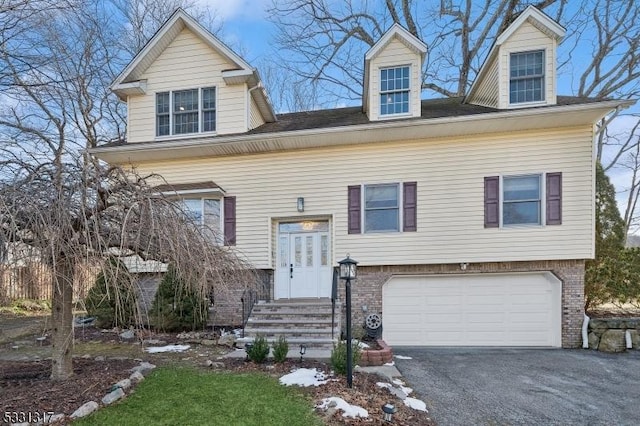 view of front of property featuring a garage