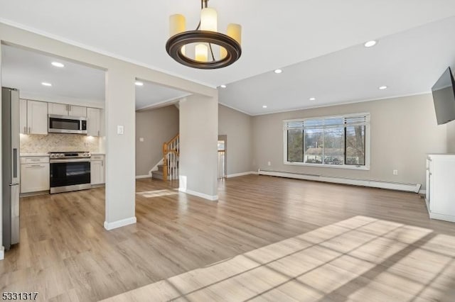 unfurnished living room with a baseboard heating unit, light hardwood / wood-style flooring, and ornamental molding