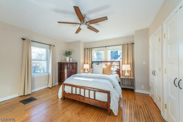 bedroom featuring ceiling fan and light hardwood / wood-style floors