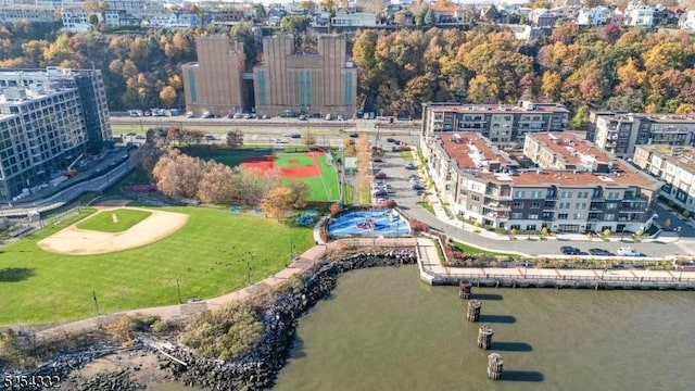 birds eye view of property featuring a water view