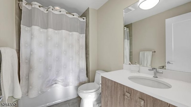 full bathroom with tile patterned flooring, vanity, toilet, and shower / bathtub combination with curtain