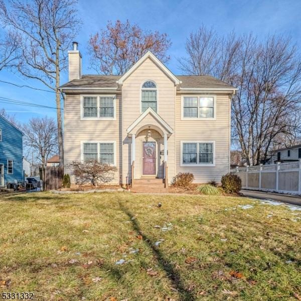 view of front of property with a front lawn