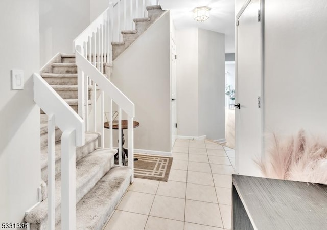 view of tiled foyer entrance