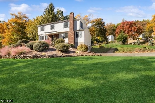 view of front of home with a front yard