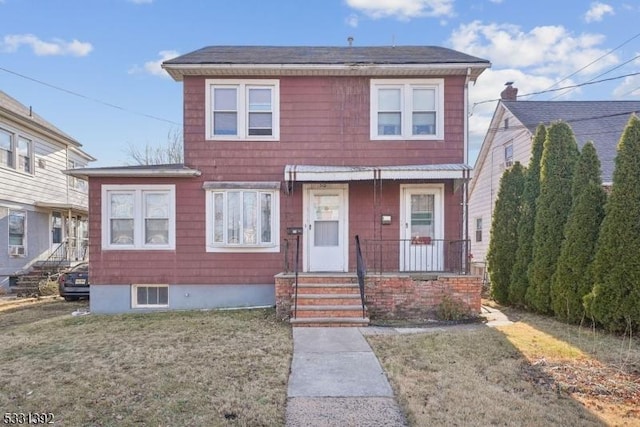 view of front of property with a front yard