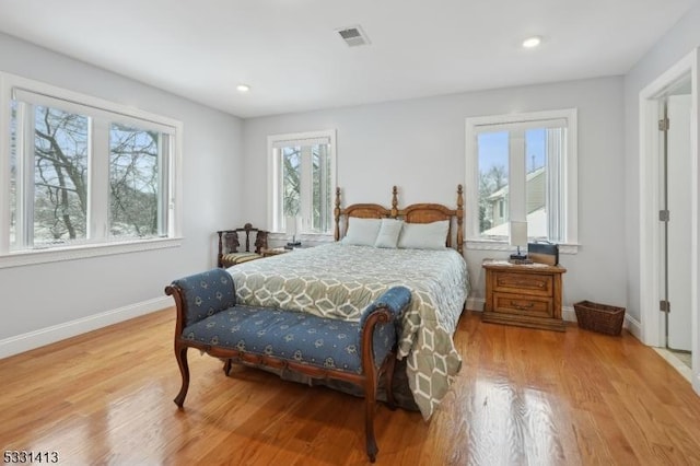 bedroom featuring light wood-type flooring