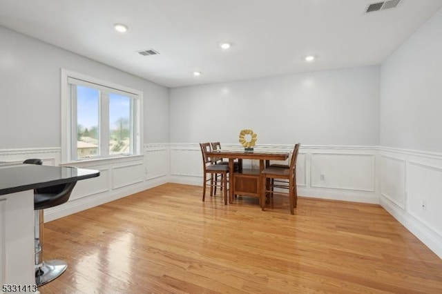 dining room featuring light hardwood / wood-style floors