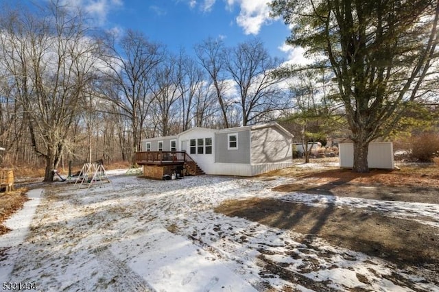 exterior space featuring a wooden deck