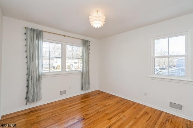 empty room featuring hardwood / wood-style floors