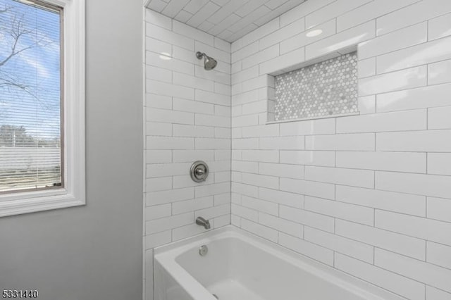 bathroom with shower / bath combination