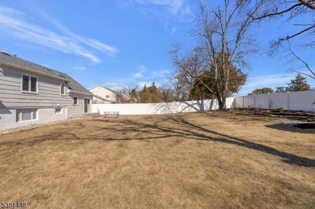 view of yard featuring a fenced backyard