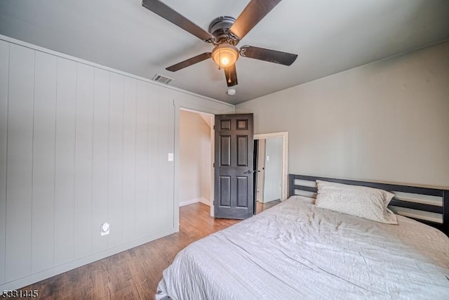 bedroom featuring ceiling fan and light wood-type flooring